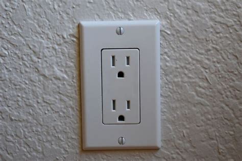 an click in electrical box|why is my outlet clicking.